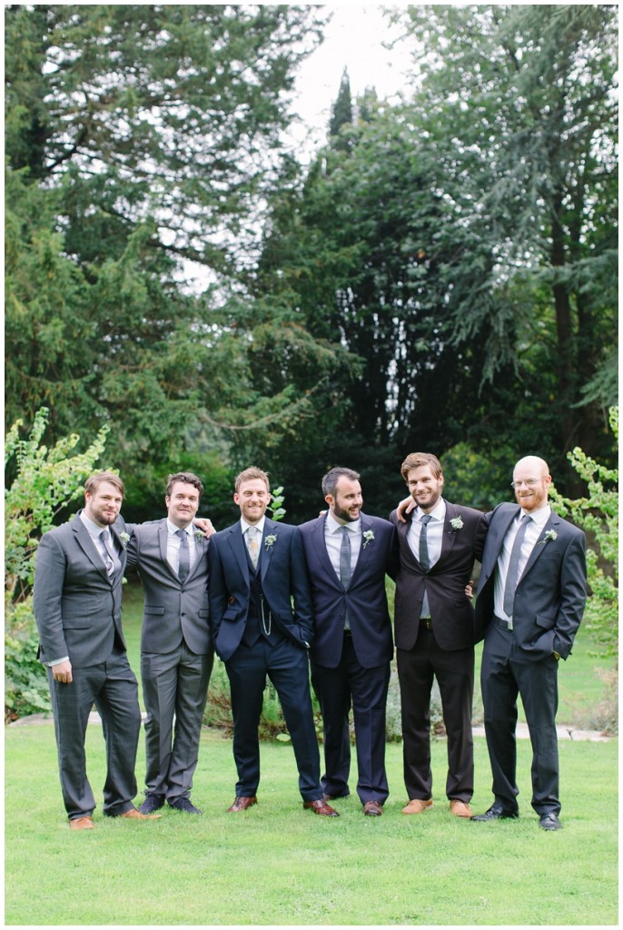 groom and ushers in mismatched suits