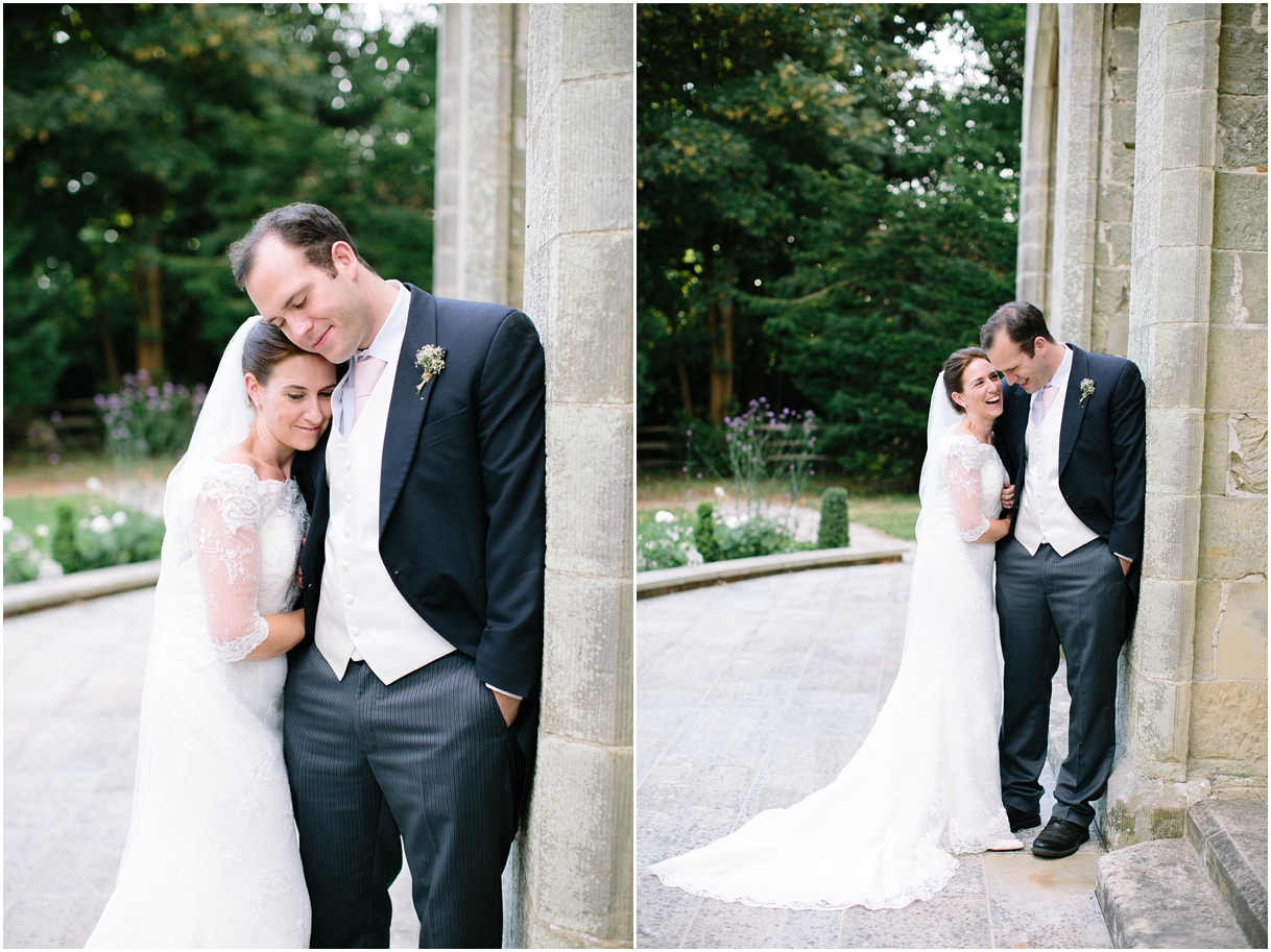 Bride and groom in orangery at Chiddingstone Castle
