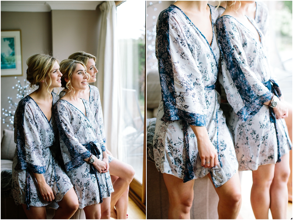 bridesmaids-in-matching-blue-and-white-robes