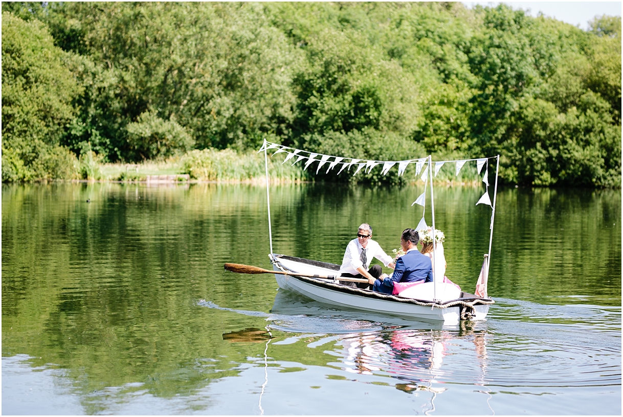 Rowing boat with bride and groom