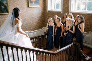 Bride getting dress at Ardington House