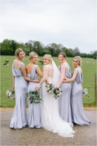 Bridesmaids in blue Ghost dresses