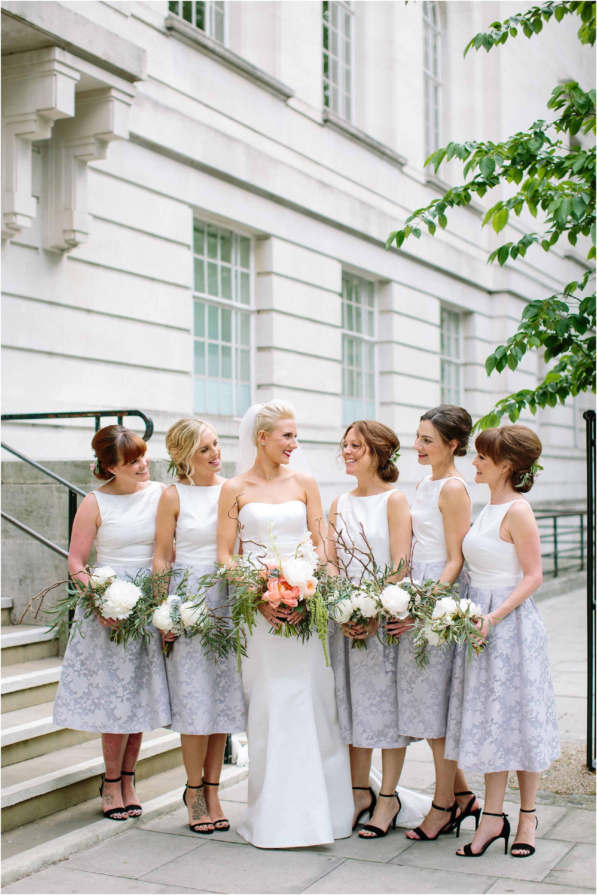 Bridesmaids in short dresses