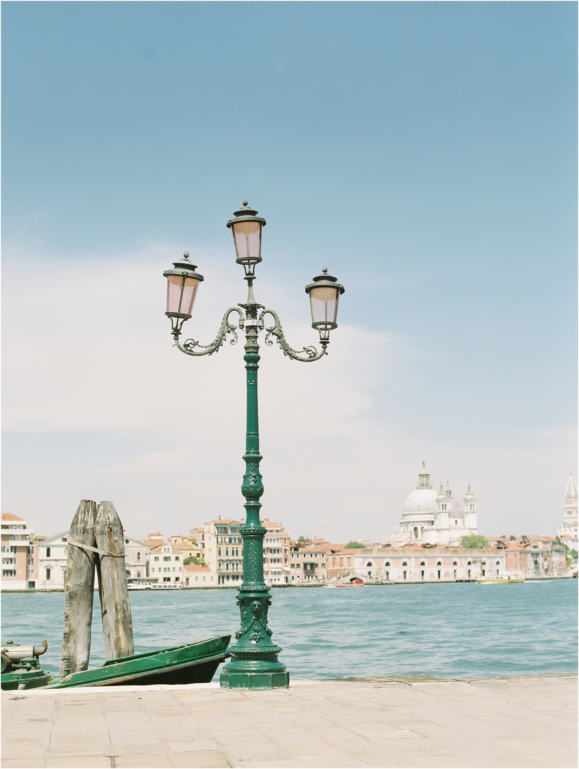 Lamp post with Venice in the background