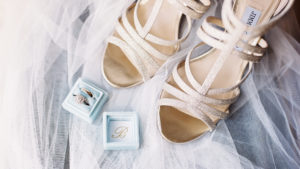 Jimmy Choo wedding shoes with wedding stationery at Chiddingstone Castle wedding