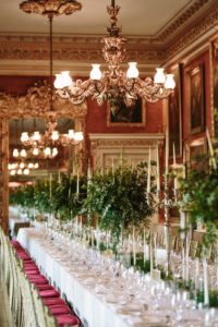 Long banqueting table set up for wedding breakfast at Goodwood House