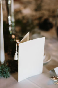 Wedding menu with silk tassel at Goodwood House wedding