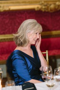 Mother of the bride crying during wedding speeches at Goodwood House
