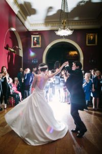 Bride and groom dancing at Goodwood House wedding