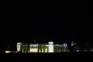 Night time photograph of Goodwood House
