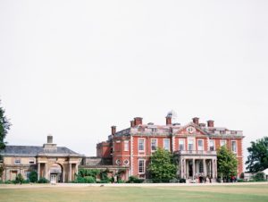 Stansted House on wedding day with guests outside