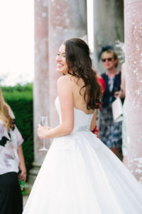 bride smiling during wedding reception at Stansted House wedding
