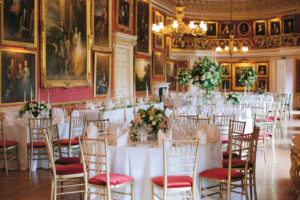The ballroom at Goodwood House set up for a wedding breakfast