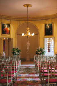 The Yellow Drawing Room at Goodwood House set up for a wedding ceremony