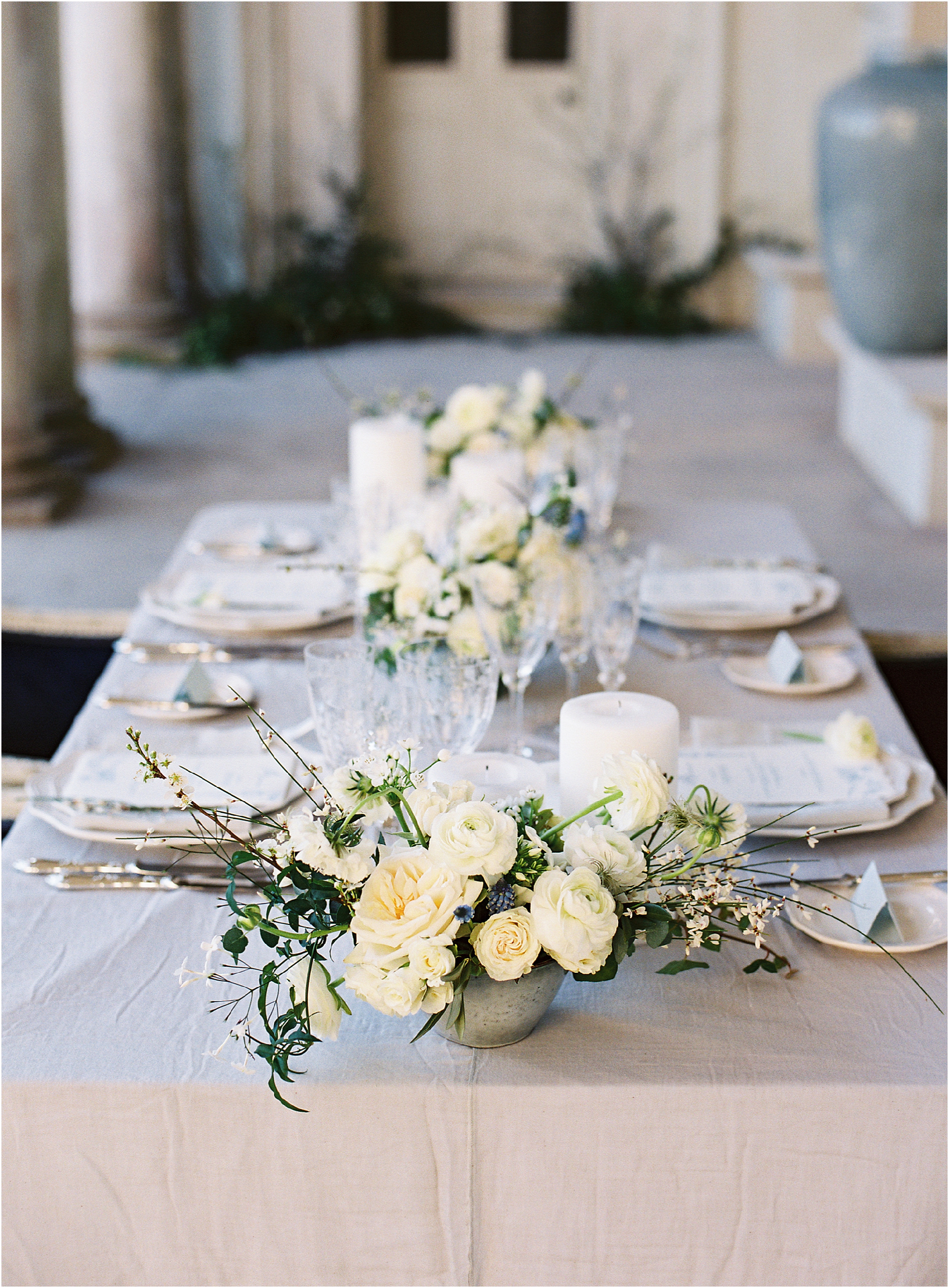 White, green and grey colour scheme for wedding breakfast table