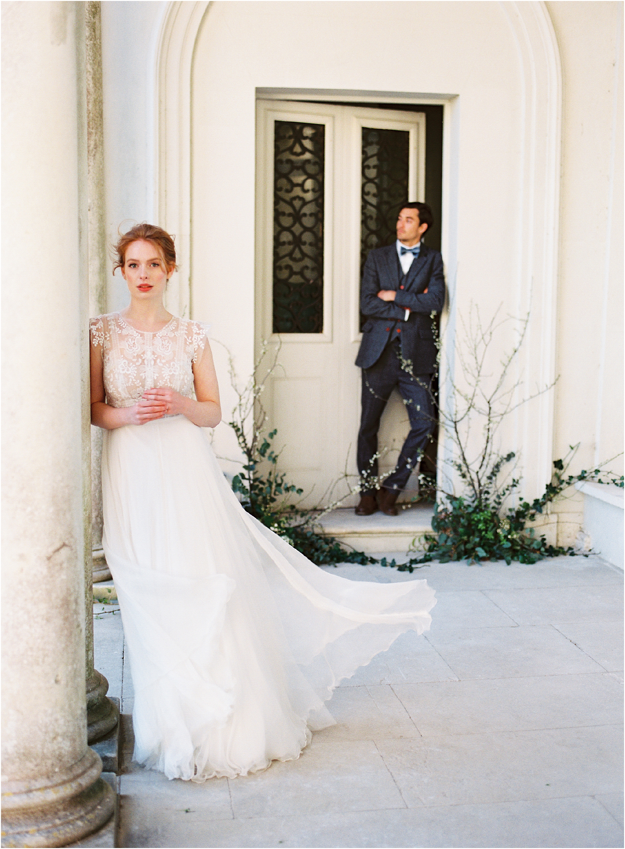 bride and groom in the porch of Somerley House wedding