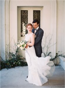 groom and bride in romantic embrace captured by film wedding photographer Camilla Arnhold