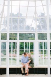 couple in love sitting in orangery