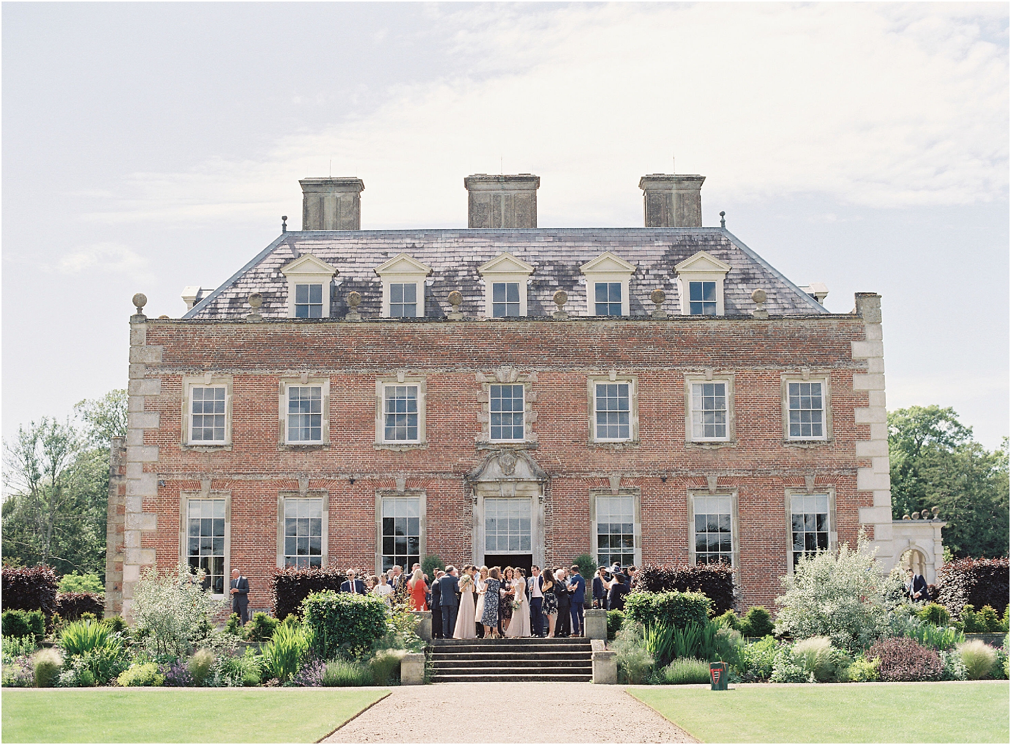 St Giles House photographed during a wedding reception by Camilla Arnhold romantic film wedding photogragraphy
