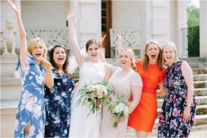 Fun group photo of girls during wedding reception at St Giles House