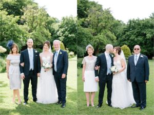 bride and groom with parents at wedding