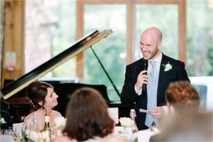 Groom giving speech to bride on wedding day