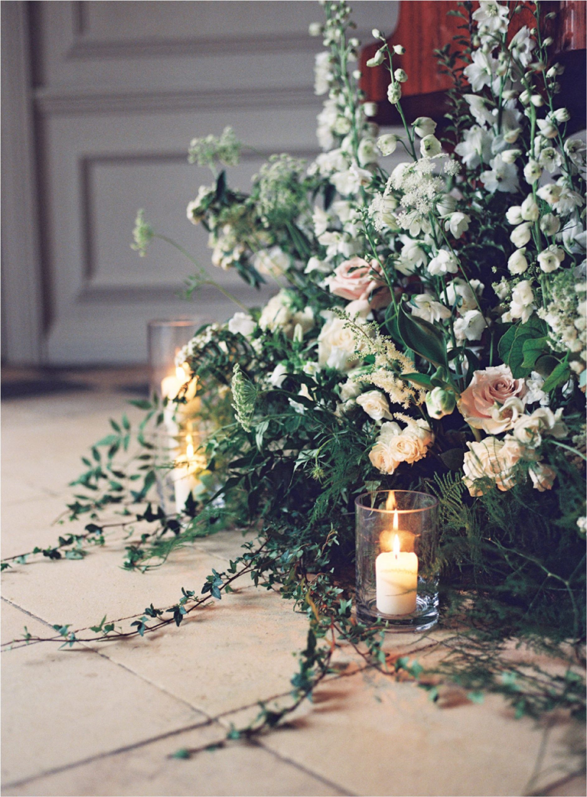 Autumn wedding flower installation with candles