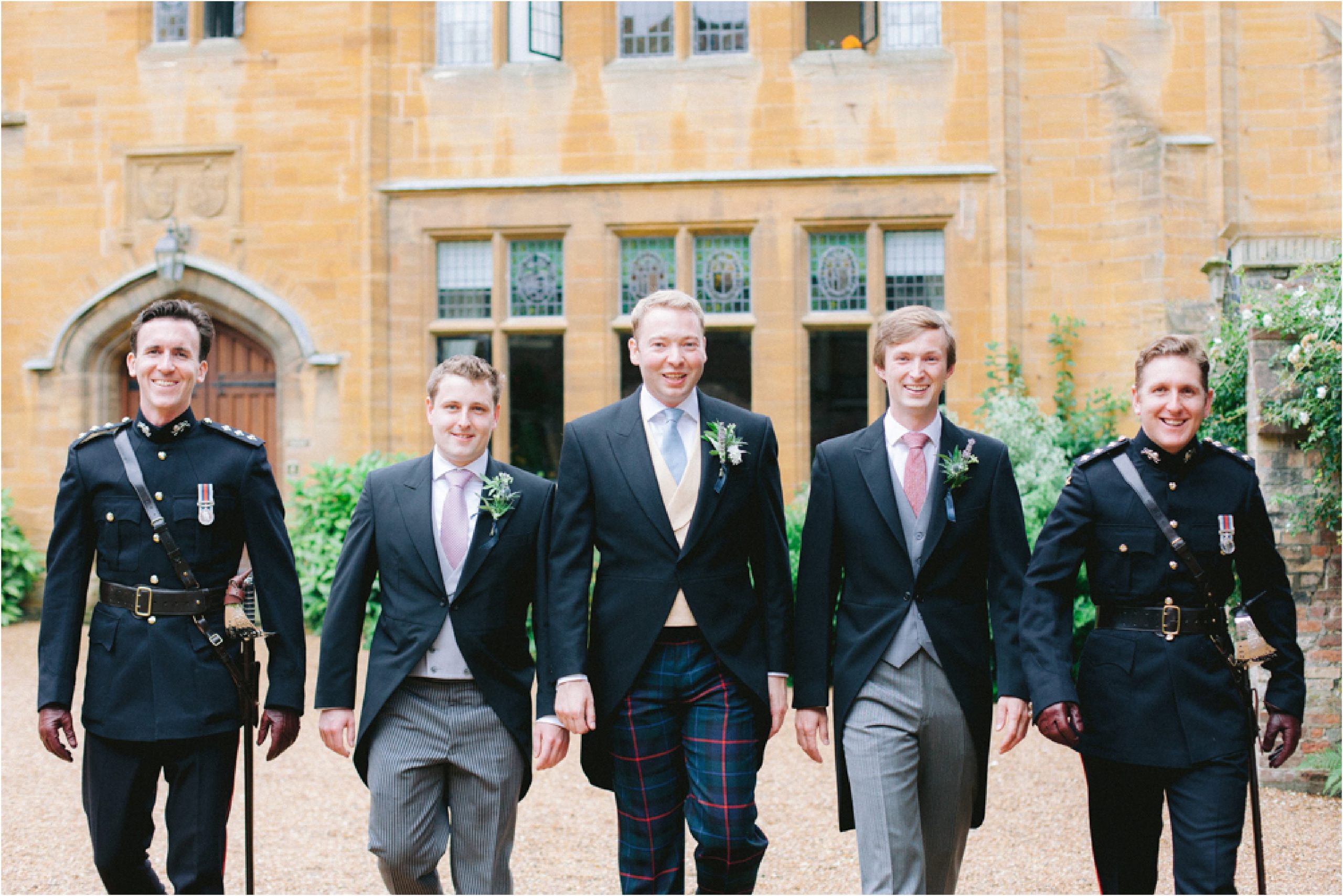 groom and ushers walking to wedding ceremony at Trinity Hall Cambridge