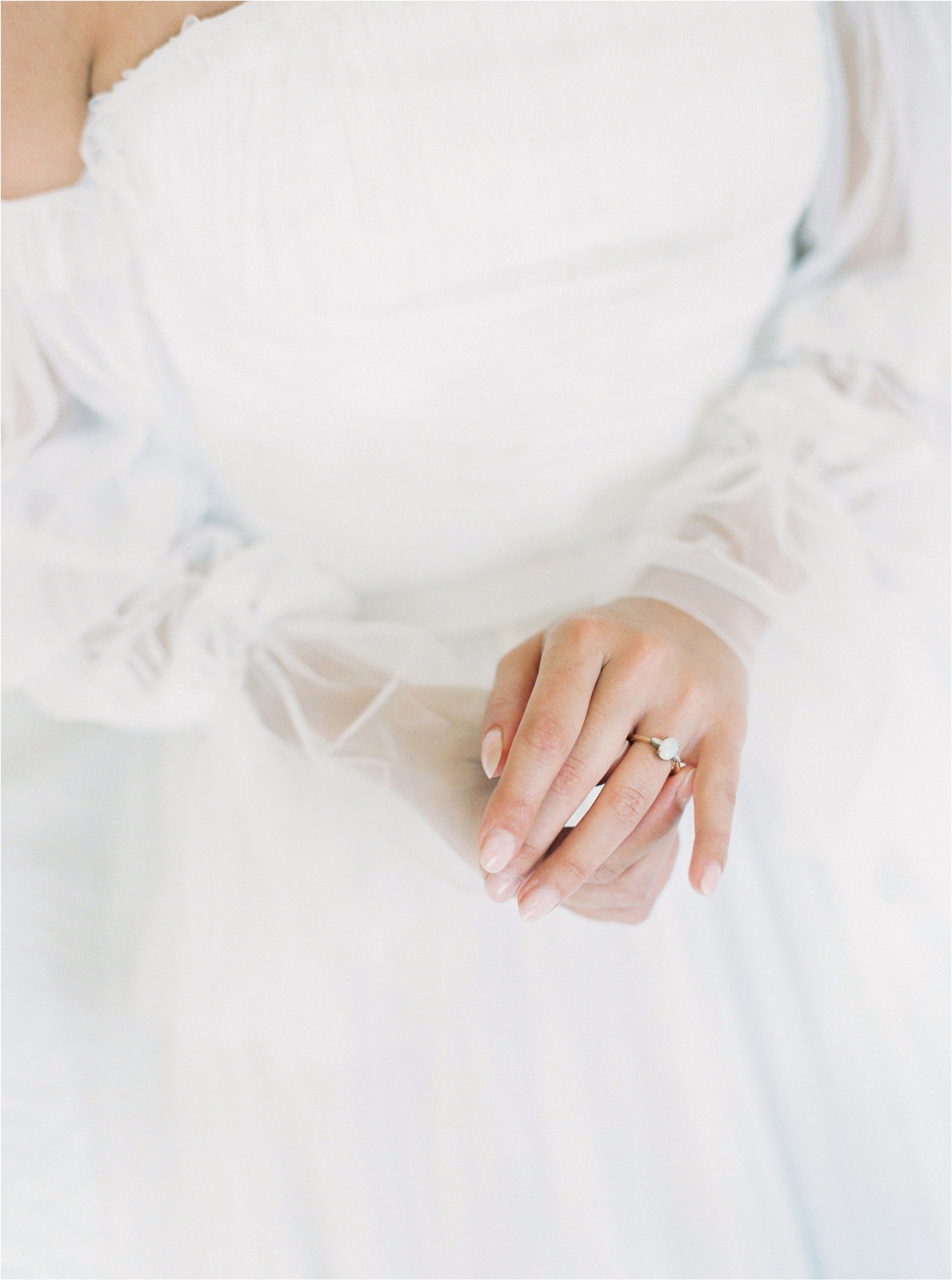 bride's hands by UK film wedding photographer