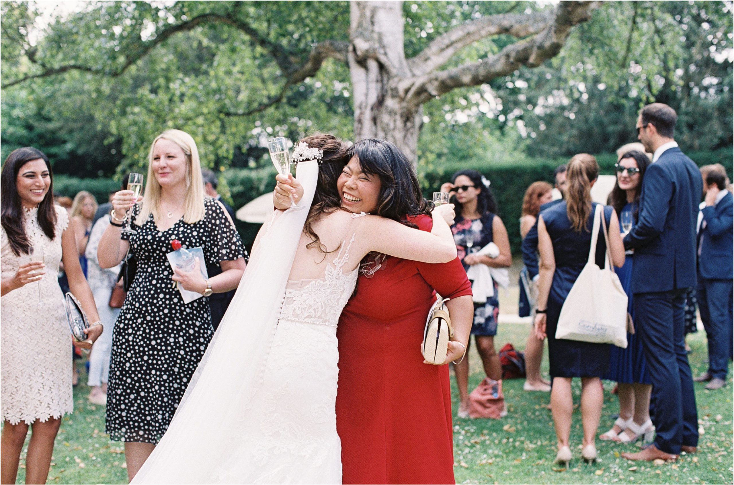 relaxed wedding photography guests hugging