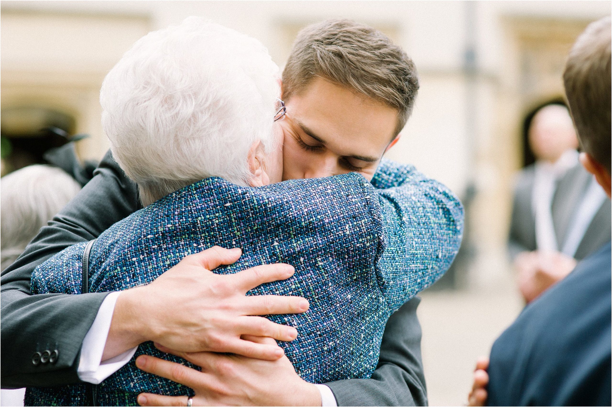 groom hugging grandmother
