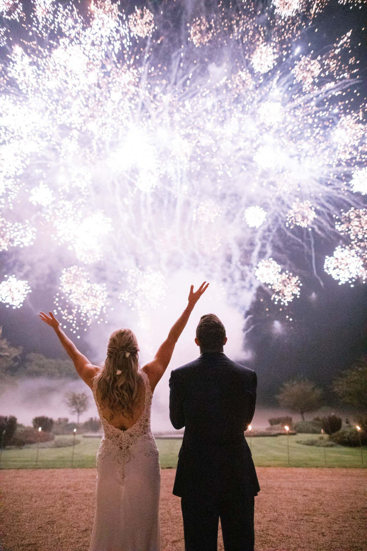 fireworks at Cowdray House wedding captured by luxury wedding photographer Camilla Arnhold