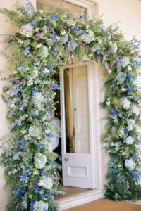 flower arch at Goodwood House Summer Wedding