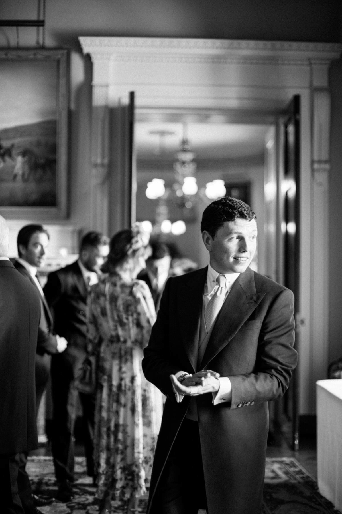 groom waiting for bride at Goodwood House