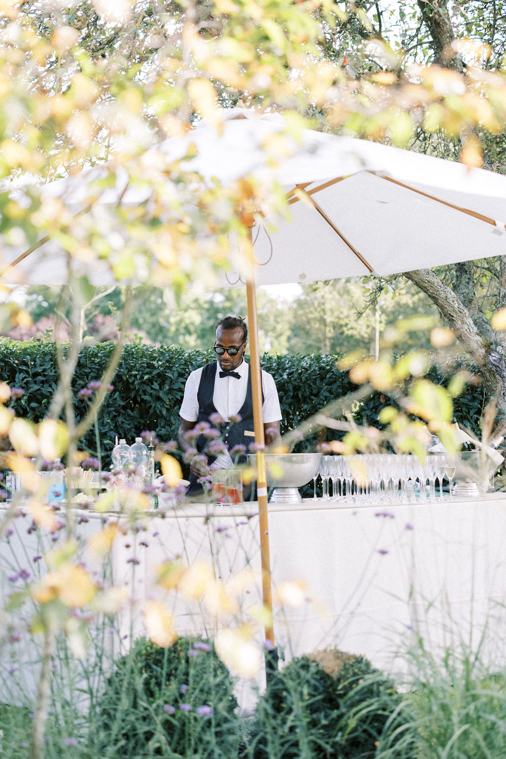 Cocktail hour at garden marquee wedding