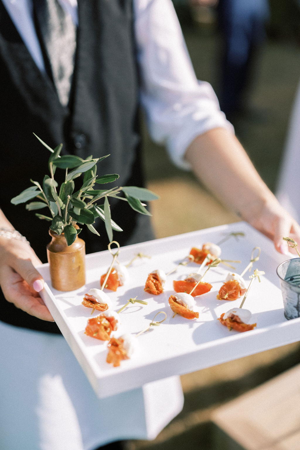 tomato canapés at garden marquee wedding reception 