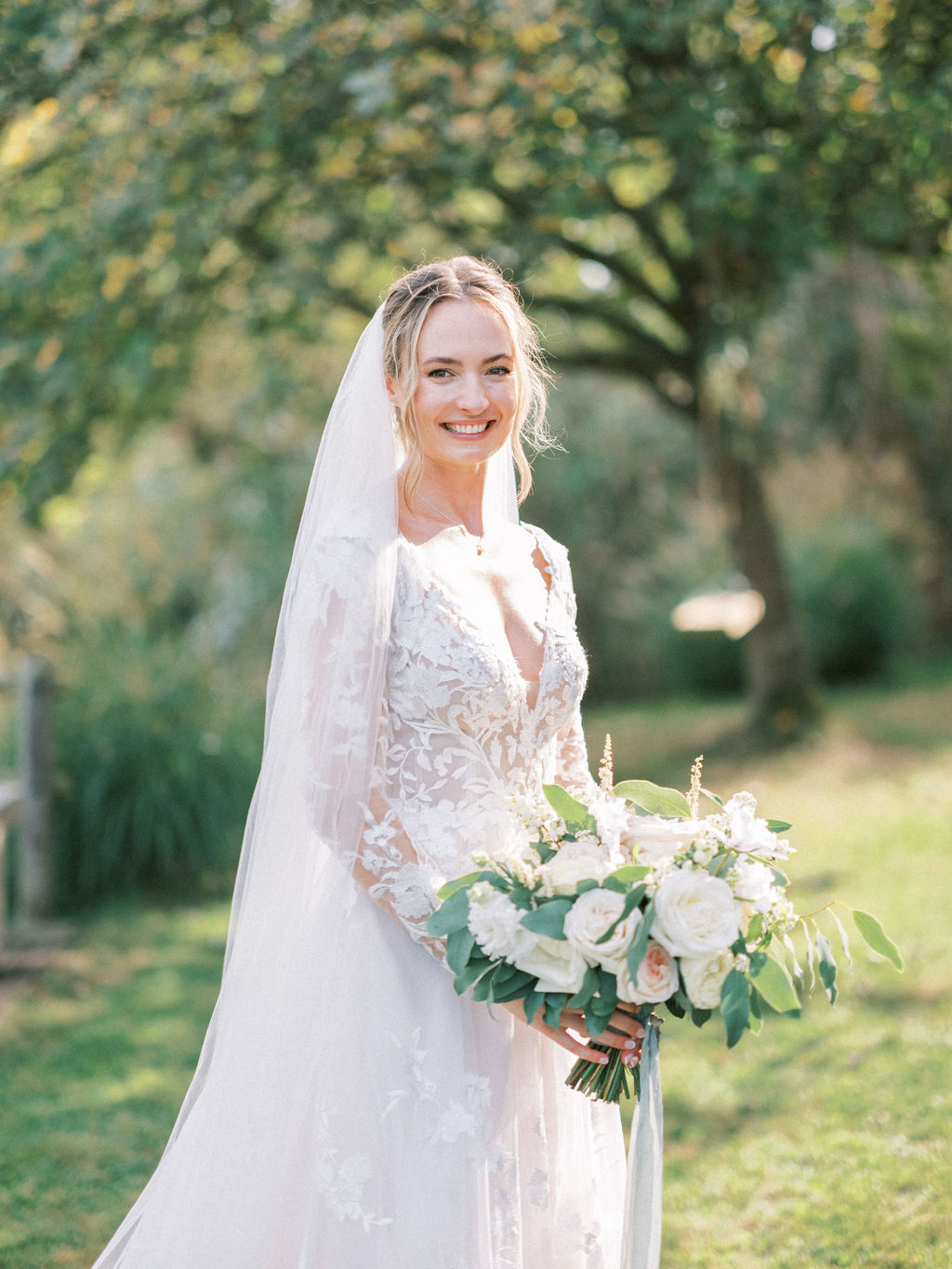 Bride and groom at garden marquee wedding