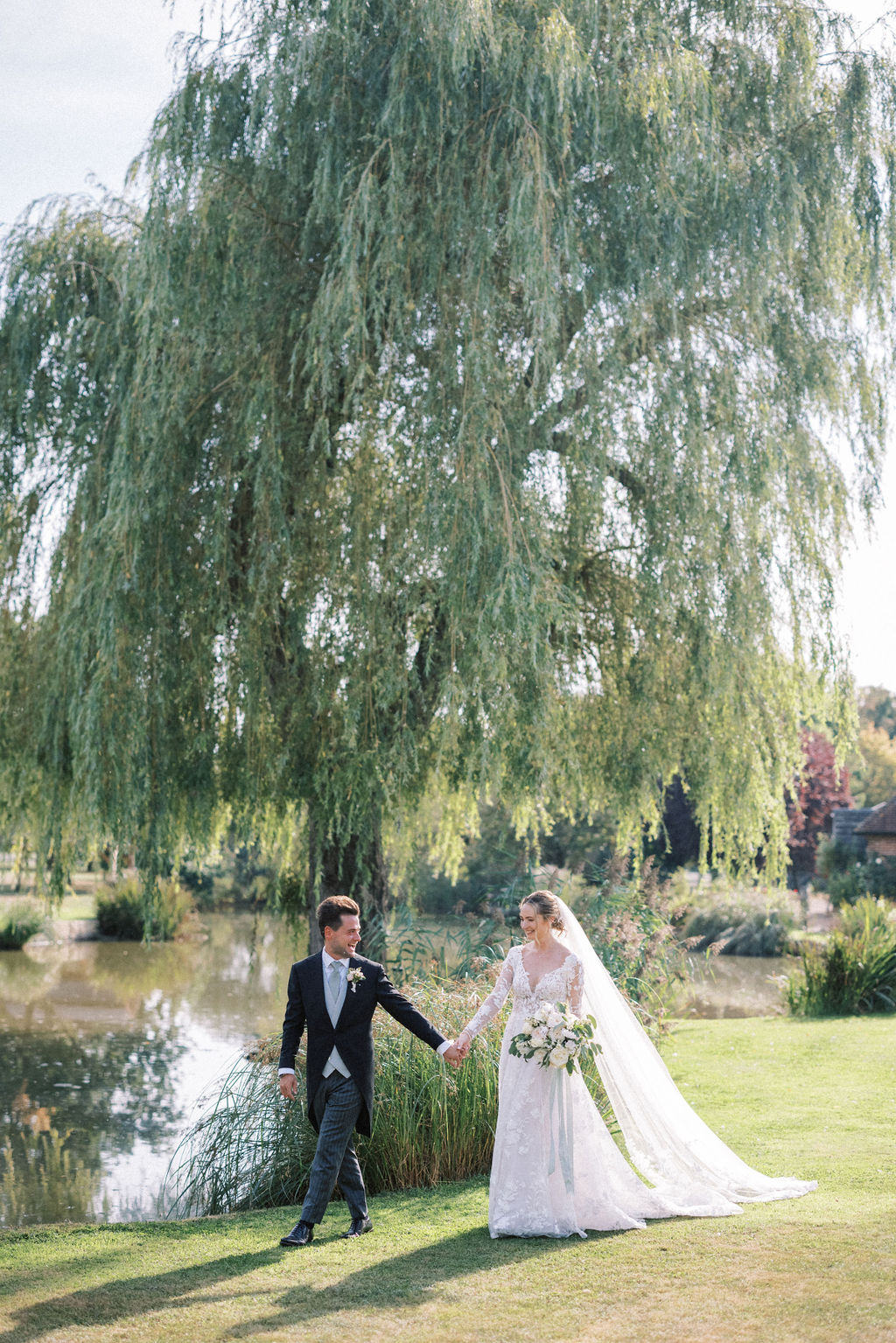 Bride and groom at garden marquee wedding