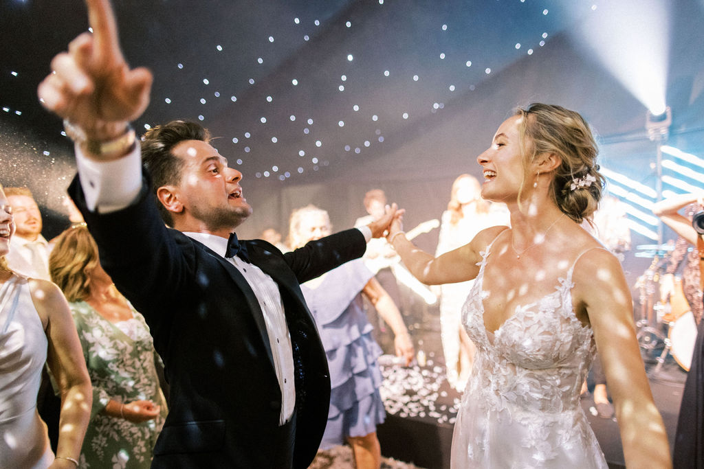 bride and groom dancing at wedding